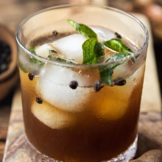 Tamarind Shikanji Mocktail: spiced brew with a curry leaf tempering