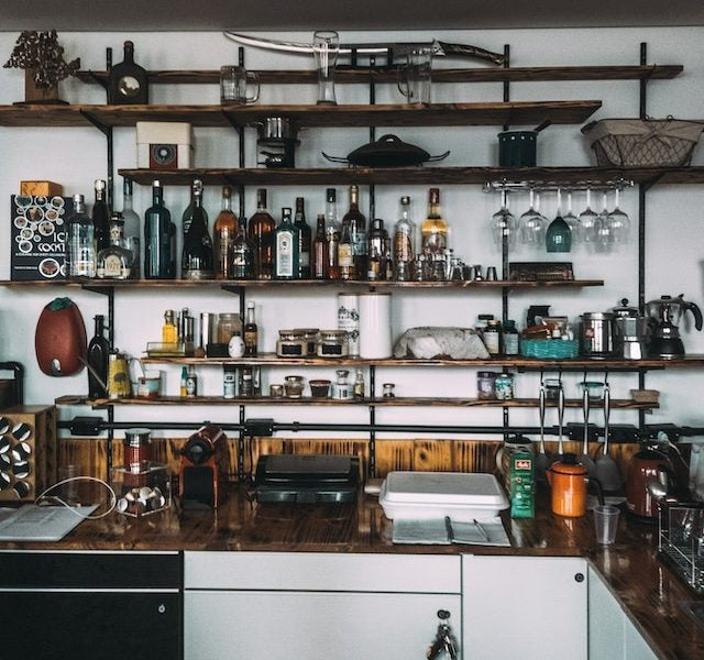 What are the five essentials for a home bar cabinet?