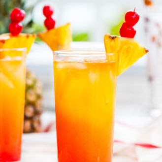 Tropical Jungle Punch: rum, tequila and vodka with passion and orange mint